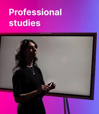 A KTU Faculty of Social Sciences, Humanities and Arts student presenting information on a touchscreen against a pink decorative background. Choose Pedagogical Professional Studies at KTU.